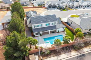 Aerial view of residential area with a pool
