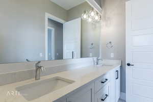 Full bathroom featuring double vanity