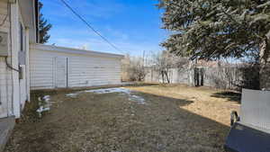 View of fenced backyard