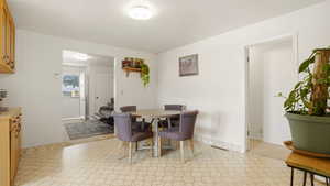 Dining room featuring light floors