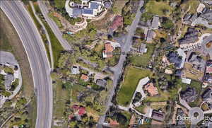 View of property location with nearby suburban area