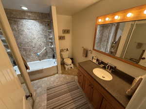Full bath with vanity and shower / bathtub combination