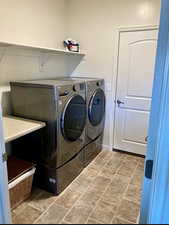 Laundry area with separate washer and dryer