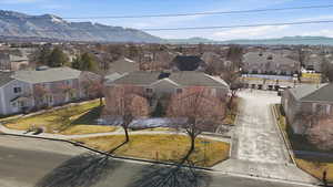 Aerial view of residential area with a mountainous background
