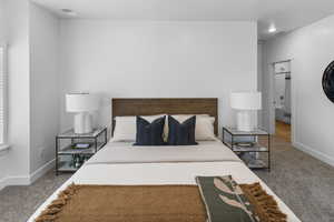 Bedroom featuring carpet