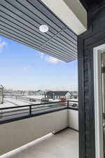 Balcony featuring a residential view