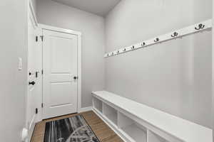 Mudroom featuring light wood-style flooring