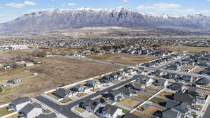 Aerial overview of property's location with nearby suburban area