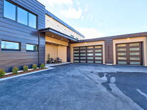 Garage featuring driveway