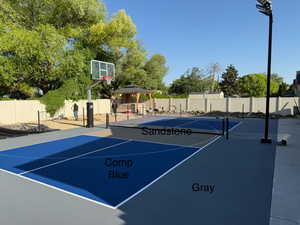 View of sport court featuring a gazebo and a tennis court