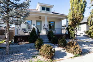 Bungalow-style house featuring covered porch