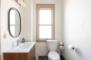 Bathroom with toilet and vanity