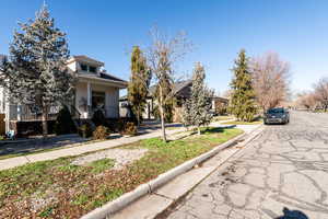 View of front facade with covered porch and a residential view