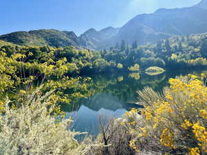 View of mountain background with a nearby body of water