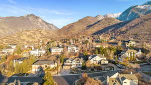 View of mountain background featuring nearby suburban area