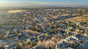 View of property location with nearby suburban area