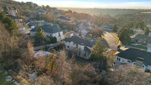 Aerial view of property's location with nearby suburban area