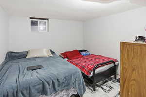 Bedroom with wood finished floors