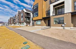 View of building exterior with a residential view