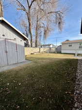 View of fenced backyard