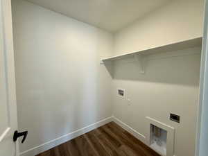 Laundry room with dark wood-style floors, hookup for a washing machine, and electric dryer hookup