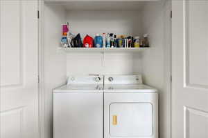 Laundry area featuring washer and clothes dryer