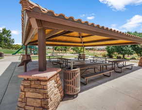 View of property's community with a patio area