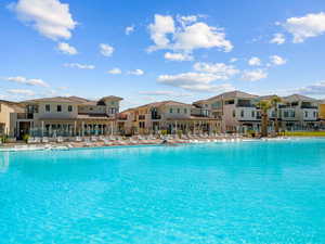 Community pool with a patio area