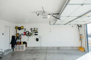 Garage featuring a garage door opener