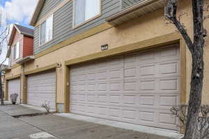 Garage with concrete driveway