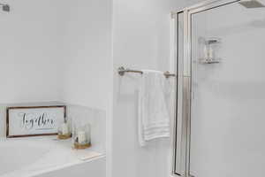 Bathroom featuring a shower stall