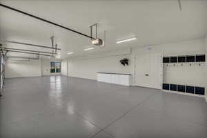 Garage featuring a garage door opener