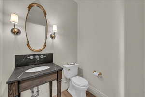 Bathroom featuring light wood-style floors and vanity