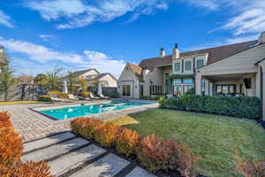 Swimming pool with a patio