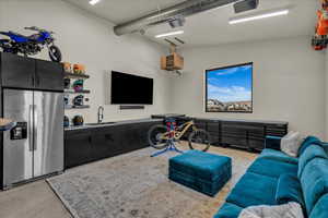 Living area with a heating unit and concrete floors