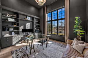 Office with light wood finished floors