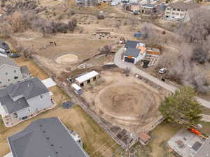 Aerial overview of property's location featuring nearby suburban area
