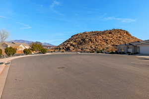 View of mountain backdrop with nearby suburban area