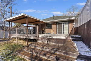 Wooden terrace with a jacuzzi