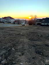 View of yard at dusk