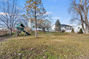 View of yard featuring a playground