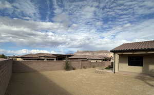 View of fenced backyard