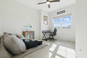 Office featuring carpet and a ceiling fan