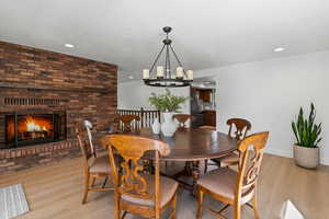 Formal Dining room featuring a brick fireplace