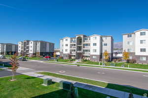 View of apartment building / complex featuring a mountain view