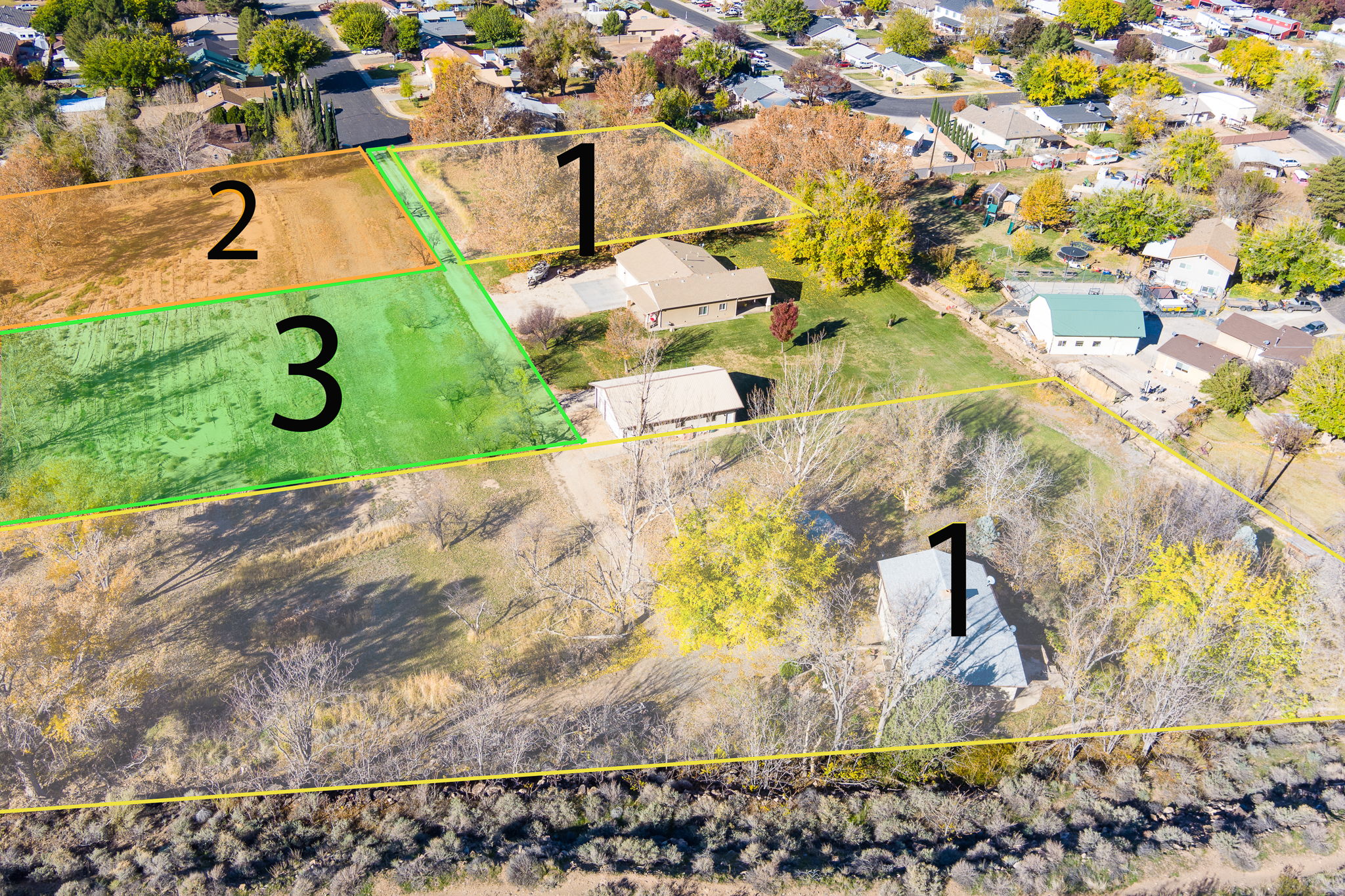 Aerial perspective of suburban area featuring property parcel outlined