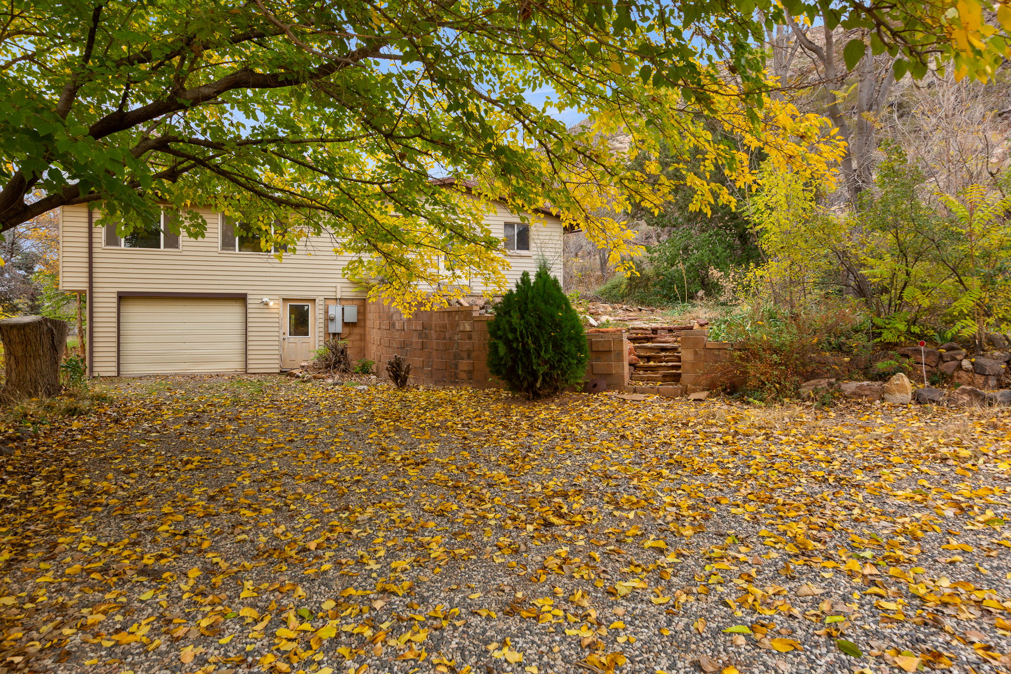 View of front facade featuring a garage