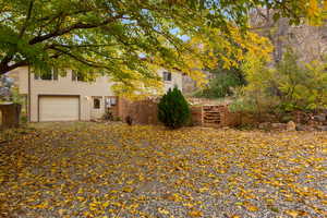 View of front facade featuring a garage