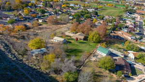 View of property location with nearby suburban area