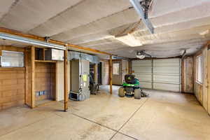 Garage featuring heating unit